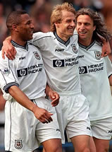 The smiles tell it all! Les Ferdinand, Jurgen Klinsmann and David Ginola celebrate a great win, and survival for Spurs!