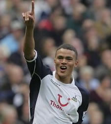 Jermaine Jenas celebrates his great free kick at Old Trafford.