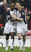 Robbie and Jermain celebrate the Spurs goal at The Stadium of Light