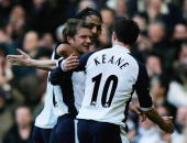 Teemu Tainio celebrates his first Spurs goal with Robbie Keane, in the corresponding game last year.