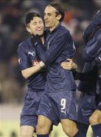 Spurs goal scorers Keane and Berbatov celebrate last week in Prague