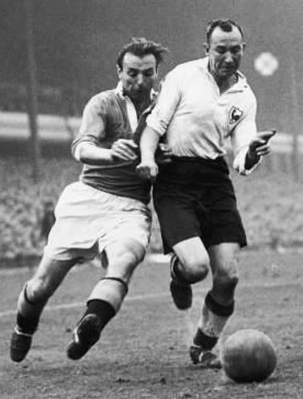 The legendary Sir Stanley Matthews in action against Spurs' Ron Burgess in the 1948 FA Cup semi-final at Villa Park