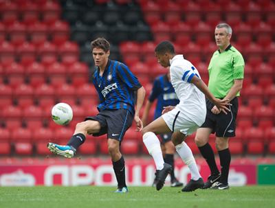 Spurs skipper Jake Nicholson in action against Inter's Duncan