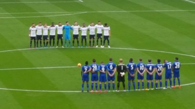 The teams pay their respects to those who made the ultimate sacrifice