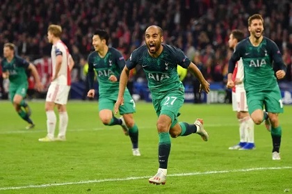 Lucas Moura celebrates his third goal against Ajax