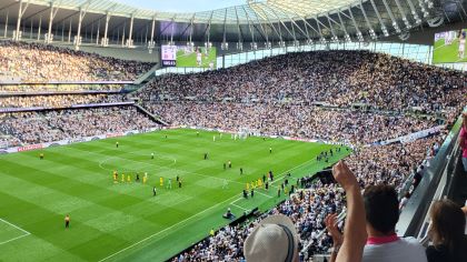 Spurs players approach the South Stand