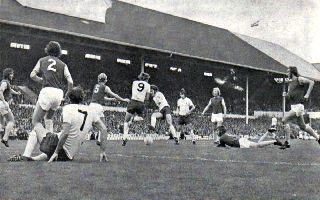 Chivers blocks Pearce shot.Bobby Moore and Billy Bonds are in the picture